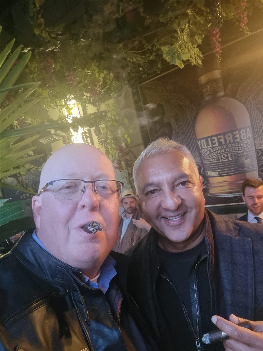 Buster Cigars founder with a guest at a cigar event
