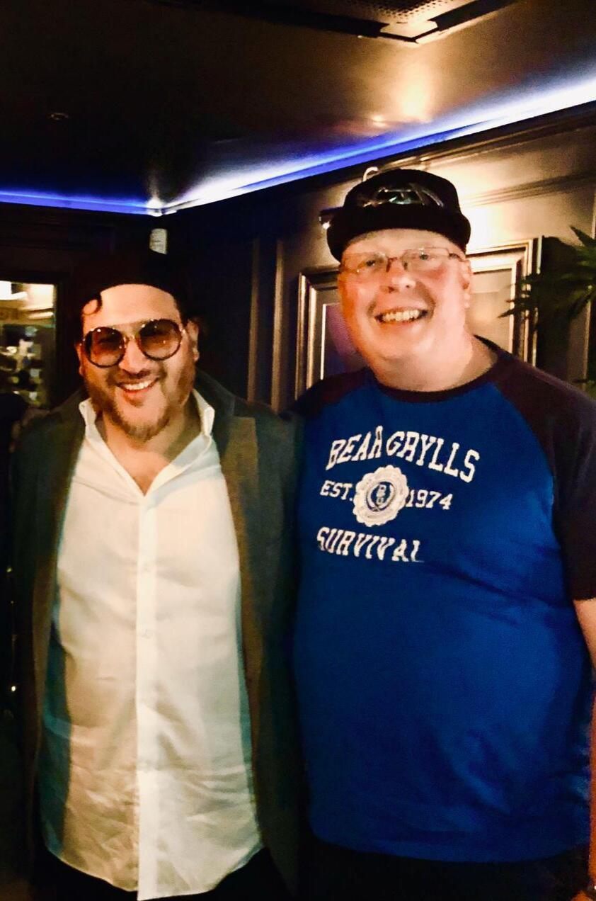 Buster Cigars founder meeting another cigar enthusiast